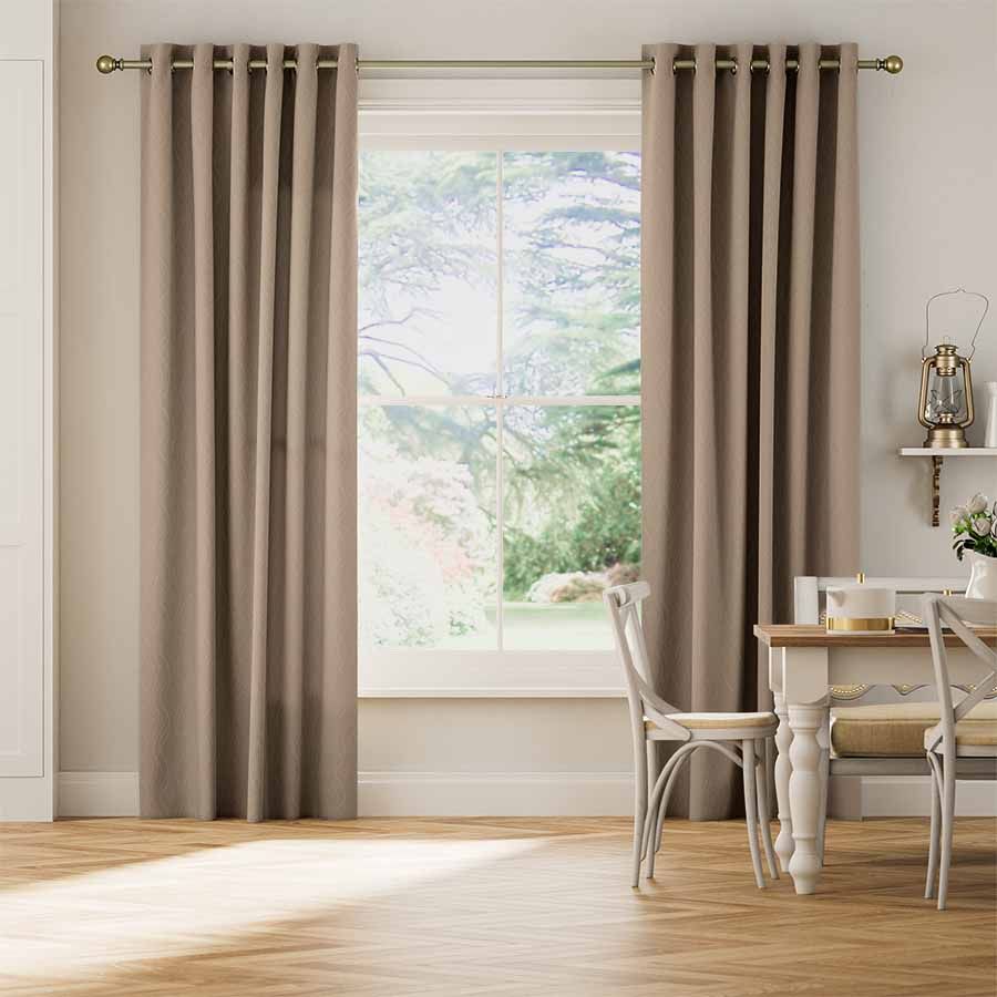 Elegant living room with flowing custom drapes